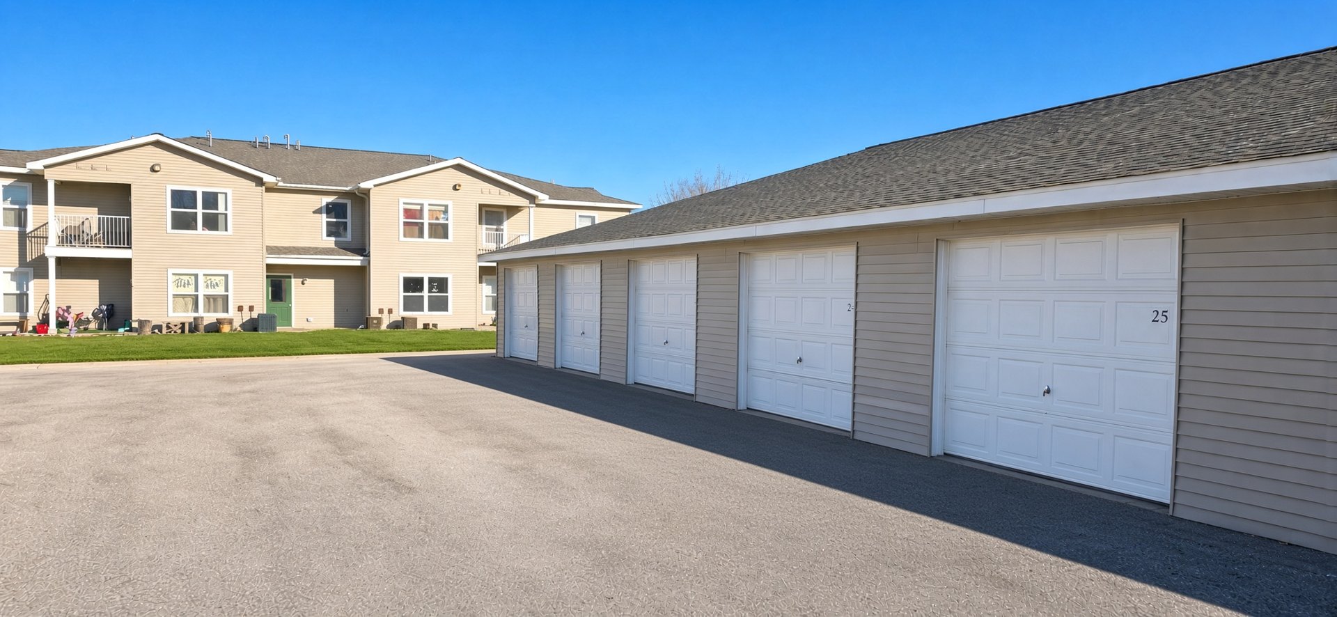 Garage row, asphalt apron